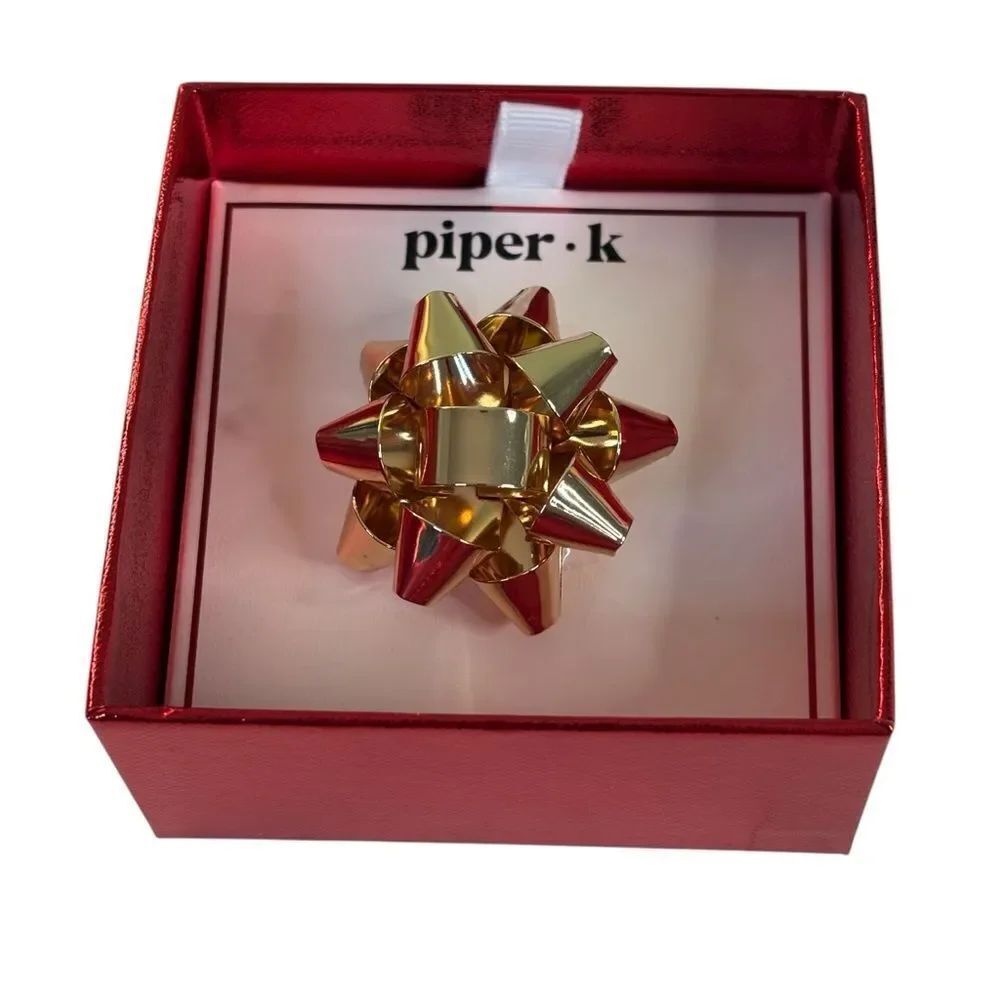 Piper K Gold Toned Metal Bow Ring. Will fit 7-8